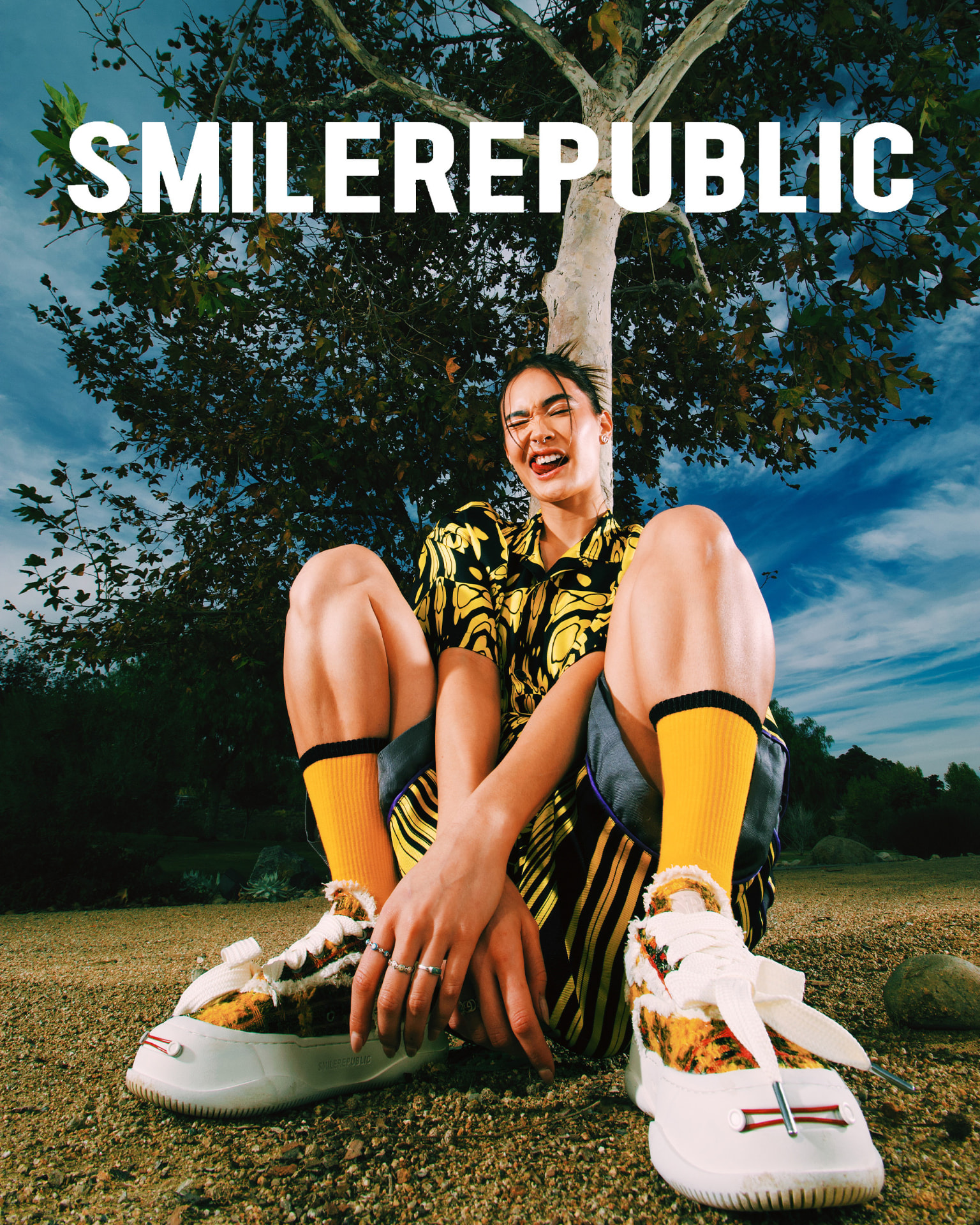 SMILEREPUBLIC sneaker campaign portrait under a tree