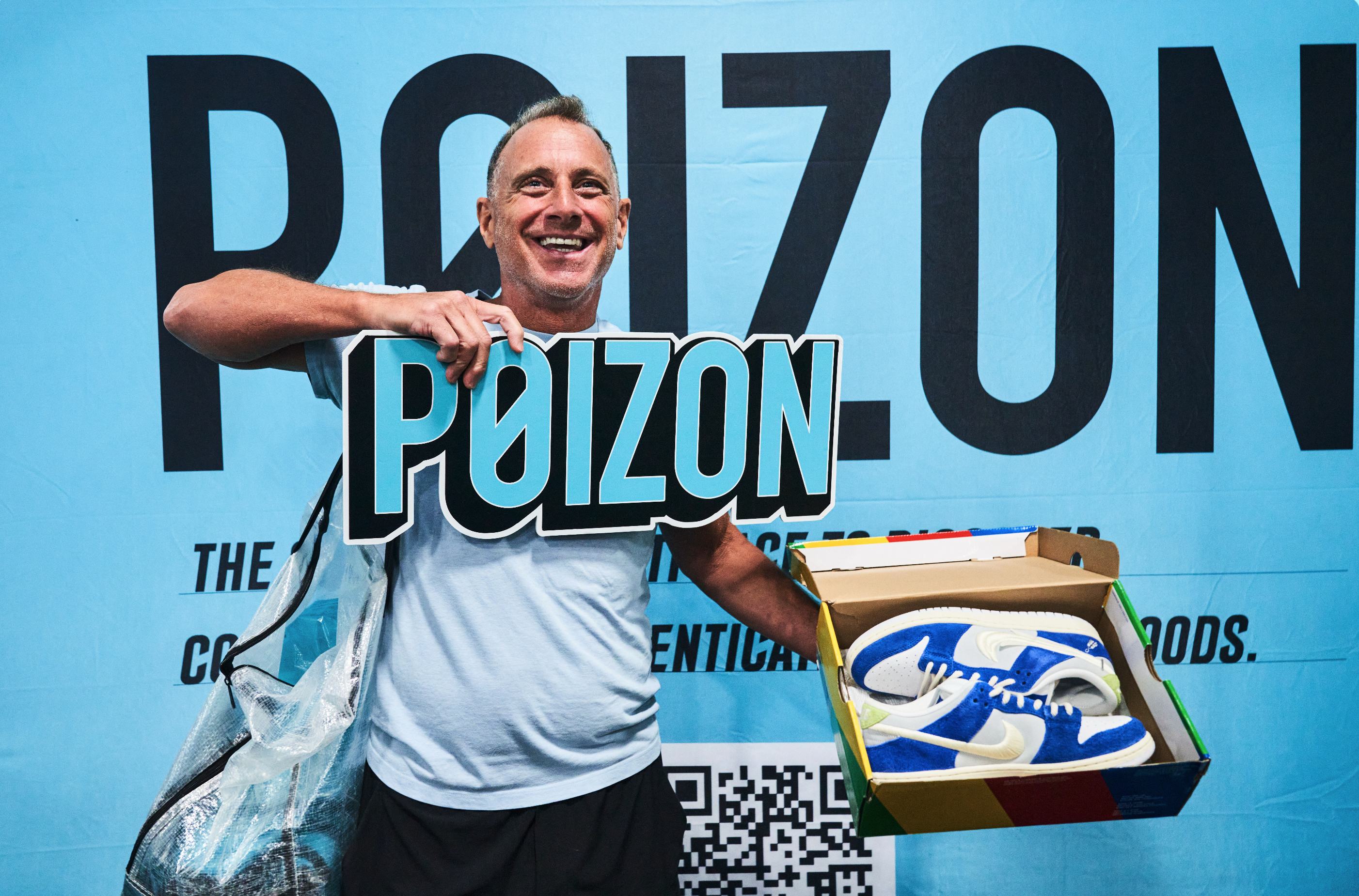 Guest holding a POIZON sneaker box at Got Sole